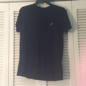 black, rose-embroidered t-shirt